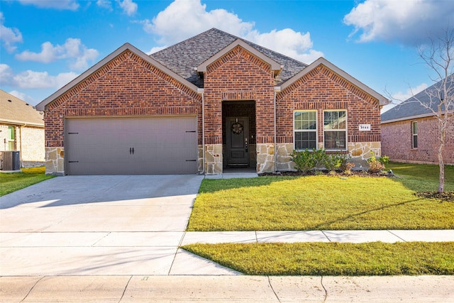 view of front of property with a garage, stone siding, brick siding, and concrete driveway