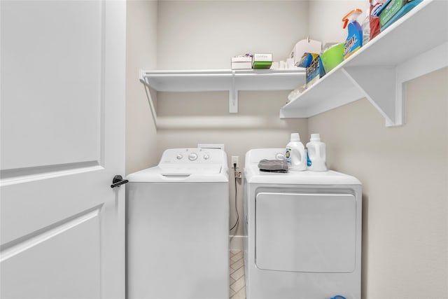 laundry area with washer and clothes dryer