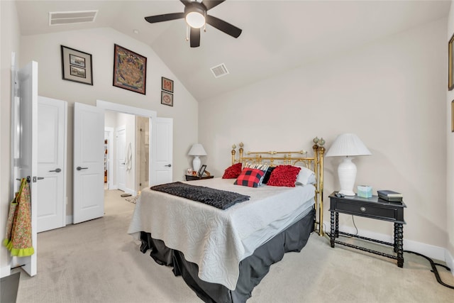 carpeted bedroom with high vaulted ceiling and ceiling fan