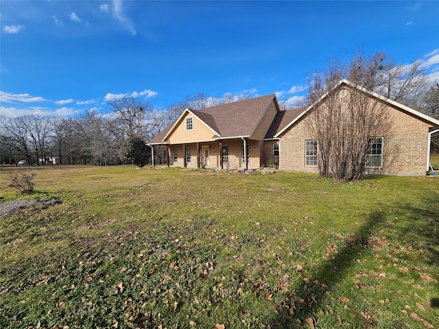 view of front of home with a front lawn