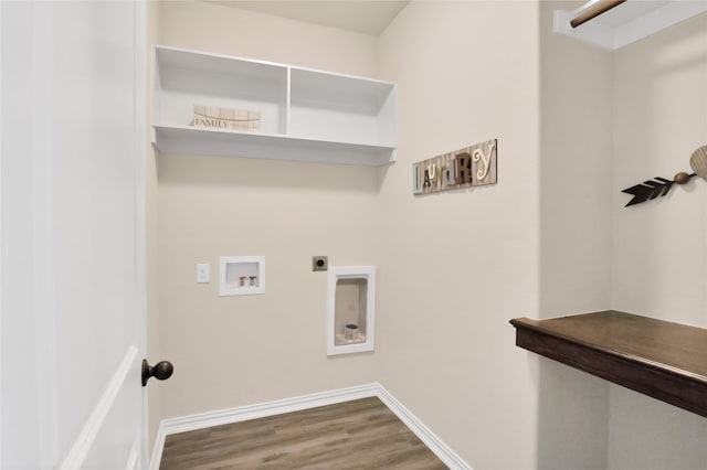 clothes washing area featuring hardwood / wood-style flooring, hookup for an electric dryer, and hookup for a washing machine