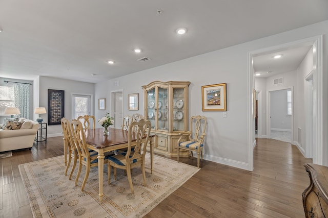 dining area with wood-type flooring