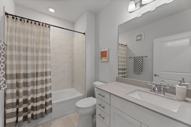 full bathroom featuring vanity, toilet, and shower / bathtub combination with curtain