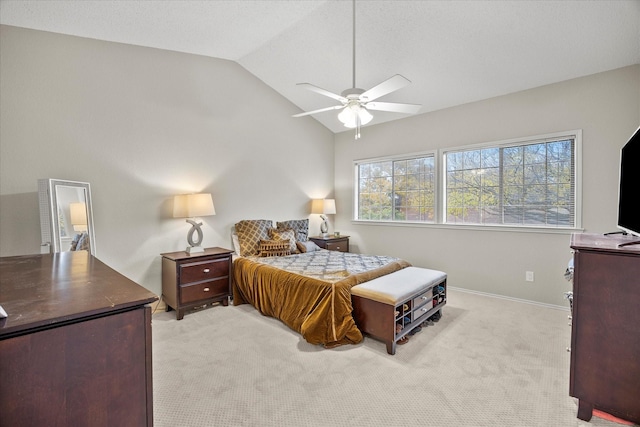 carpeted bedroom with lofted ceiling and ceiling fan