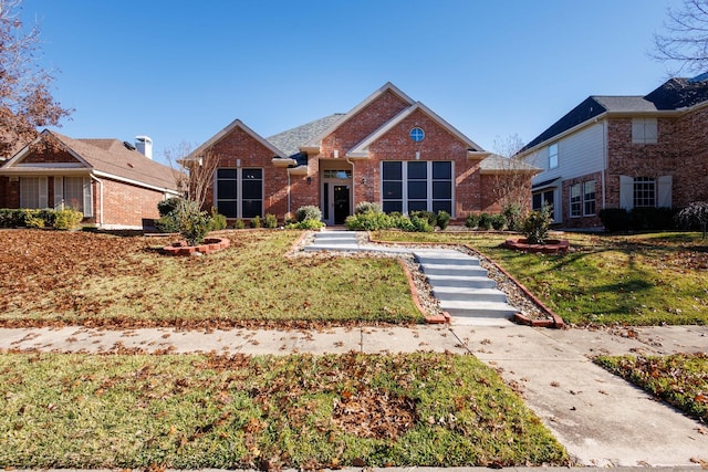 view of front of home with a front yard