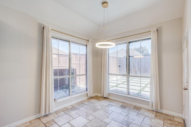 unfurnished dining area with a healthy amount of sunlight