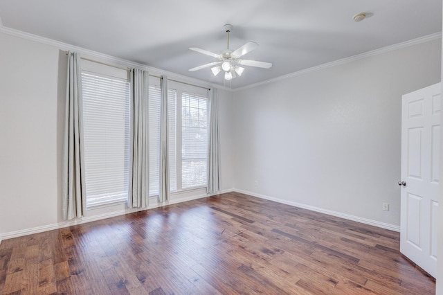 spare room with ceiling fan, dark wood-type flooring, and ornamental molding