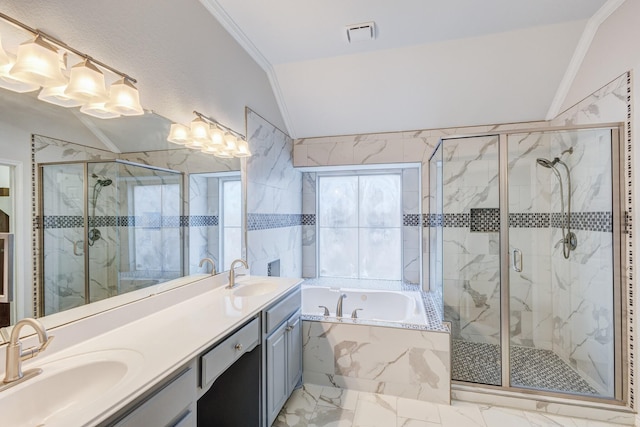 bathroom featuring vanity, ornamental molding, vaulted ceiling, and shower with separate bathtub