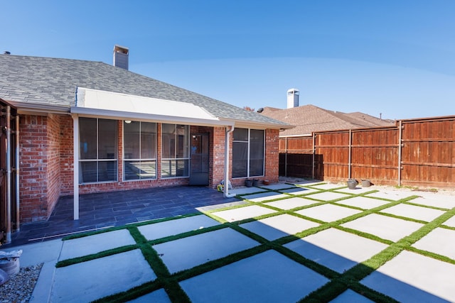 exterior space with a sunroom