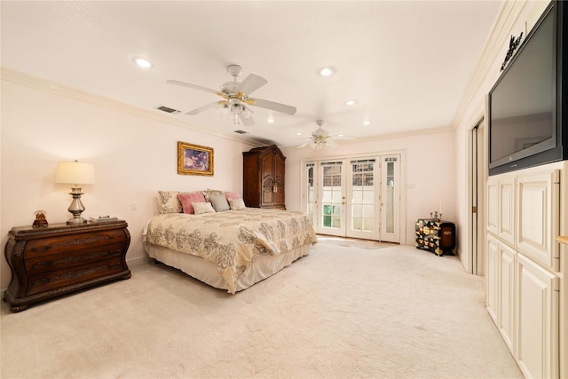 carpeted bedroom with access to exterior, french doors, ceiling fan, and crown molding