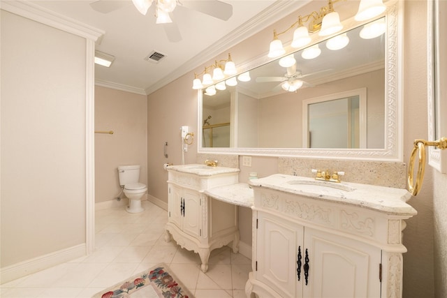 bathroom featuring vanity, tile patterned floors, crown molding, toilet, and an enclosed shower