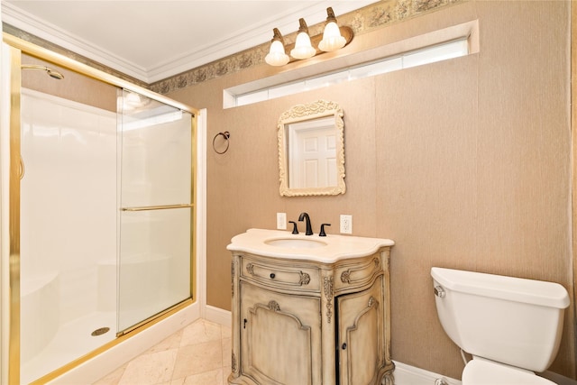 bathroom with vanity, toilet, a shower with shower door, and ornamental molding