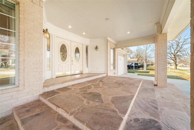 entrance to property featuring a garage