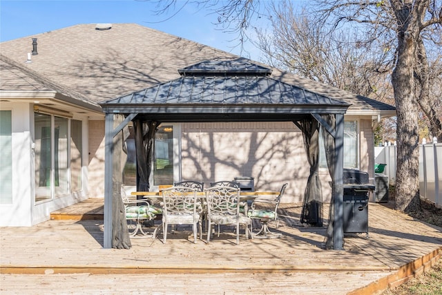 wooden terrace with a gazebo