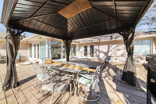 wooden terrace with a gazebo