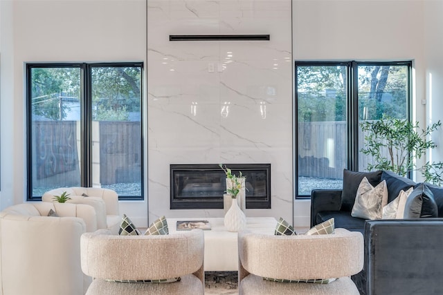 living room featuring a fireplace