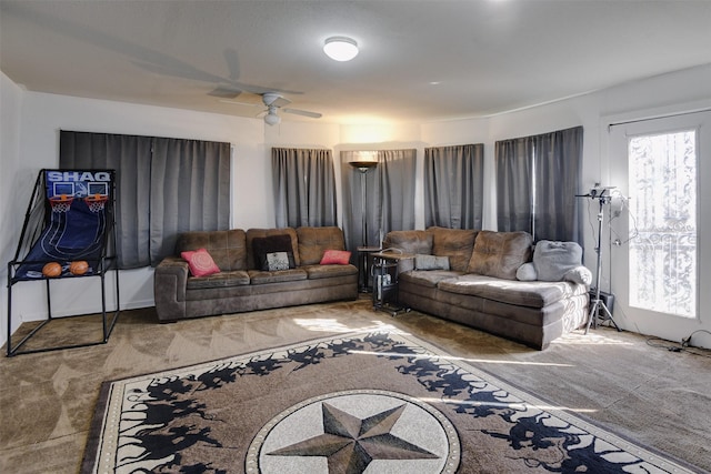 living room featuring carpet floors and ceiling fan