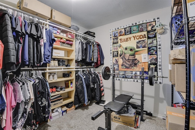 spacious closet with carpet floors