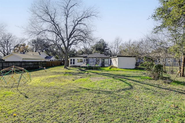 view of yard with a trampoline