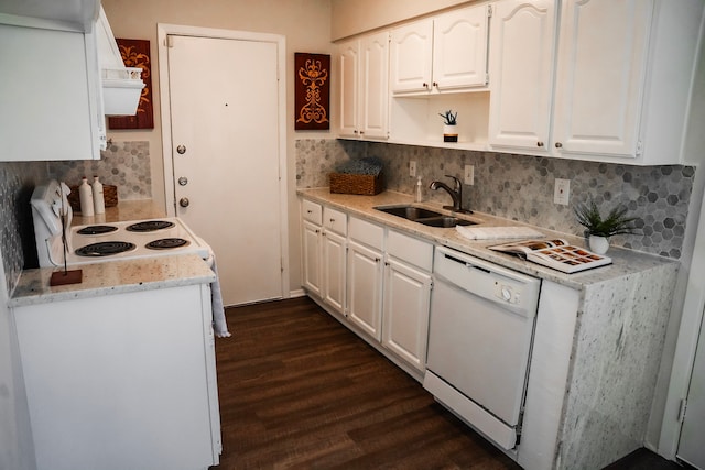 kitchen featuring white appliances, white cabinetry, and sink