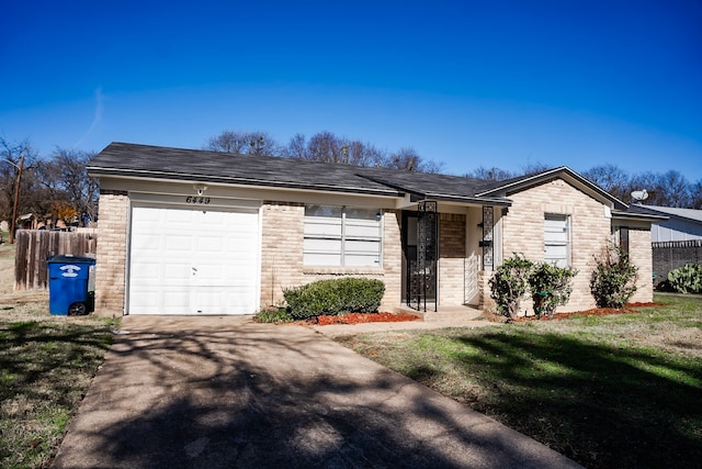 ranch-style house with a front lawn and a garage