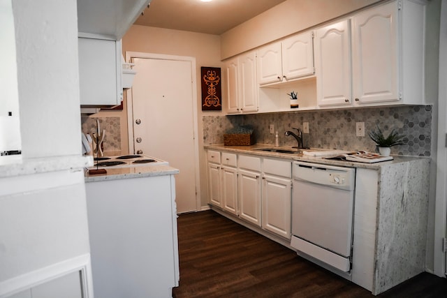 kitchen with white dishwasher, dark hardwood / wood-style floors, white cabinets, and tasteful backsplash