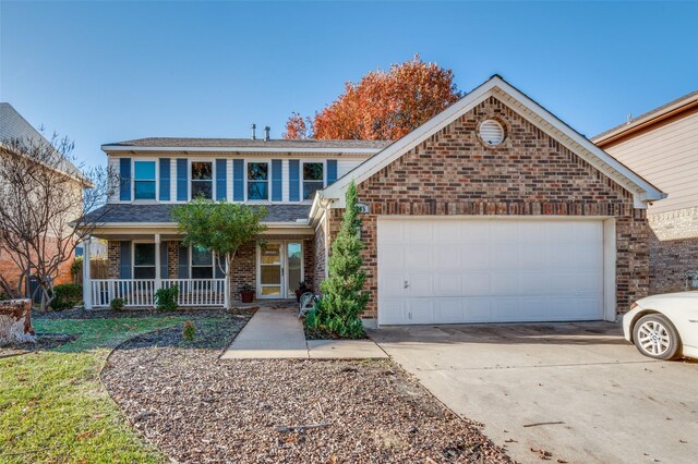 front facade featuring a garage and a porch