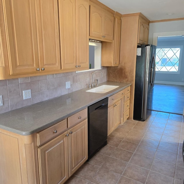 kitchen with dishwasher, light brown cabinets, sink, ornamental molding, and stainless steel refrigerator