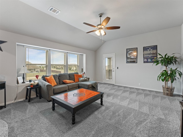 living room with carpet flooring, ceiling fan, and vaulted ceiling