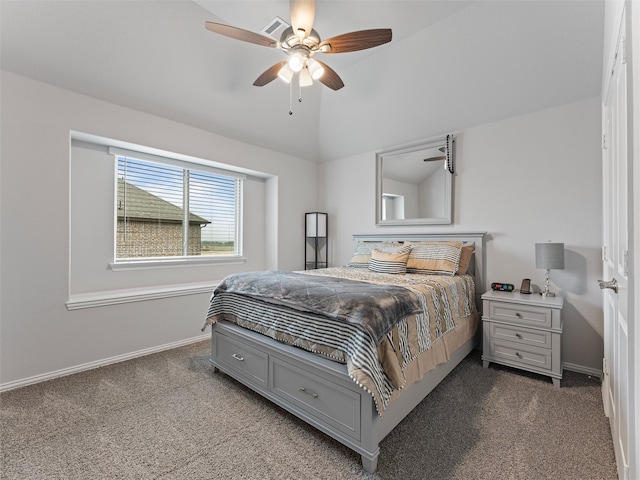 bedroom with dark colored carpet, ceiling fan, and lofted ceiling