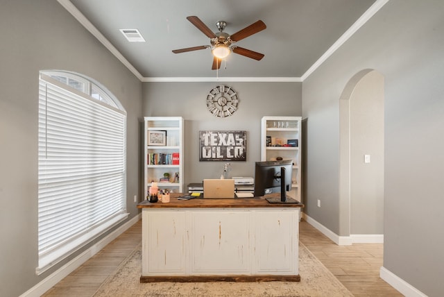 office area with ceiling fan and ornamental molding