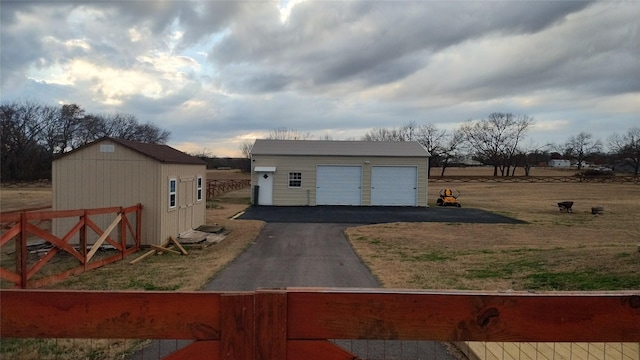 garage with a lawn