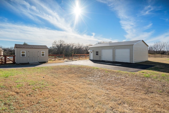 exterior space featuring a shed and a garage