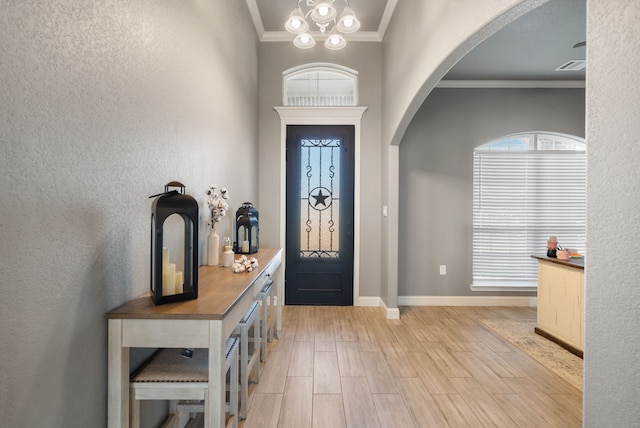 foyer entrance with ornamental molding