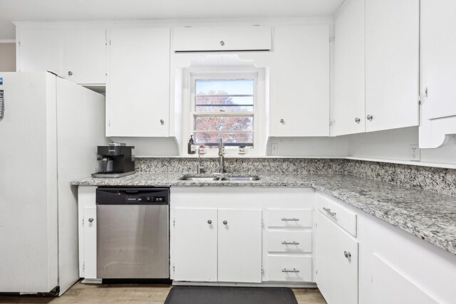 kitchen featuring dishwasher, light wood-type flooring, white cabinetry, and sink