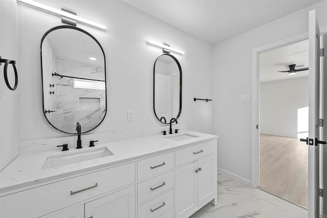 bathroom with a shower, wood-type flooring, vanity, and ceiling fan