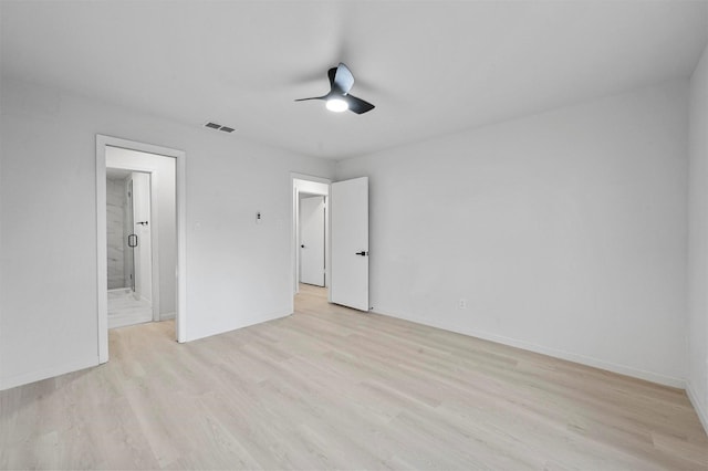 unfurnished bedroom with light wood-type flooring and ceiling fan