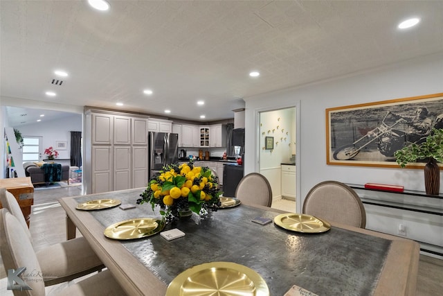 dining room featuring vaulted ceiling