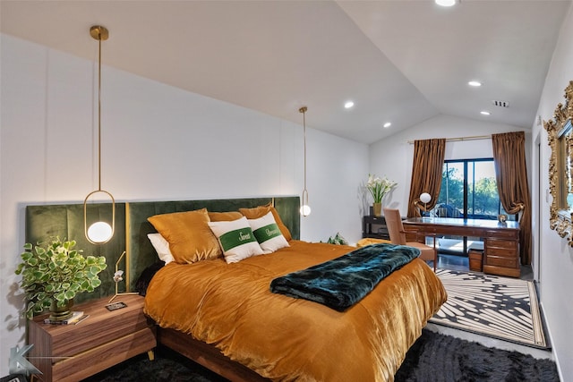 bedroom featuring vaulted ceiling