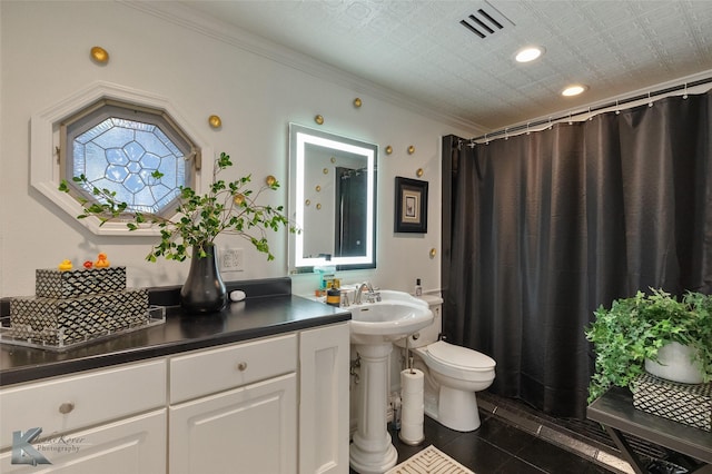 bathroom with toilet, tile patterned flooring, and ornamental molding