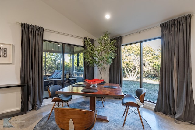 dining area with lofted ceiling