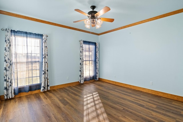 spare room with crown molding, ceiling fan, and dark hardwood / wood-style floors