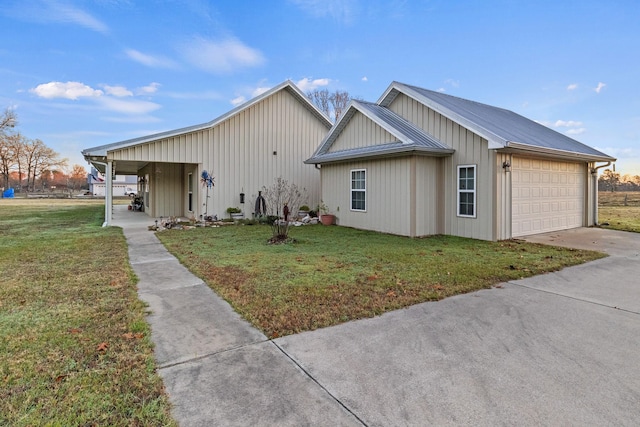 view of front of house with a front yard and a carport