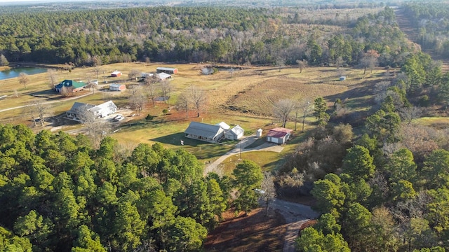 drone / aerial view featuring a rural view and a water view