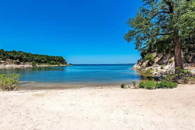 view of water feature featuring a beach view