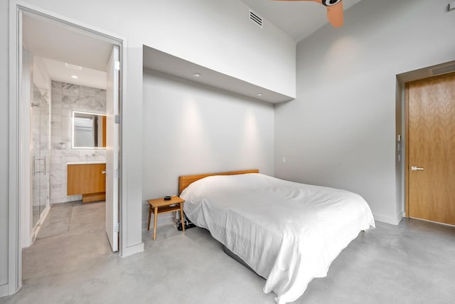 bedroom with ceiling fan and ensuite bathroom