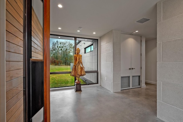 interior space with concrete flooring