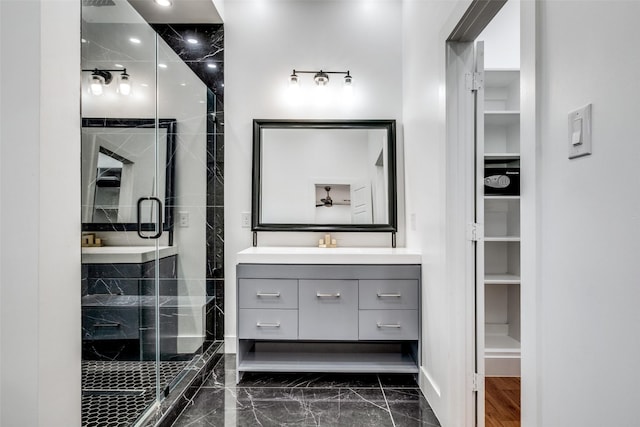 bathroom with vanity and walk in shower