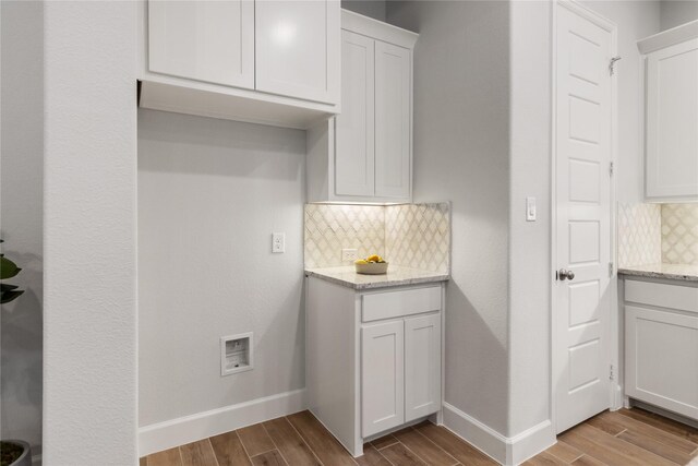 laundry area featuring light hardwood / wood-style flooring