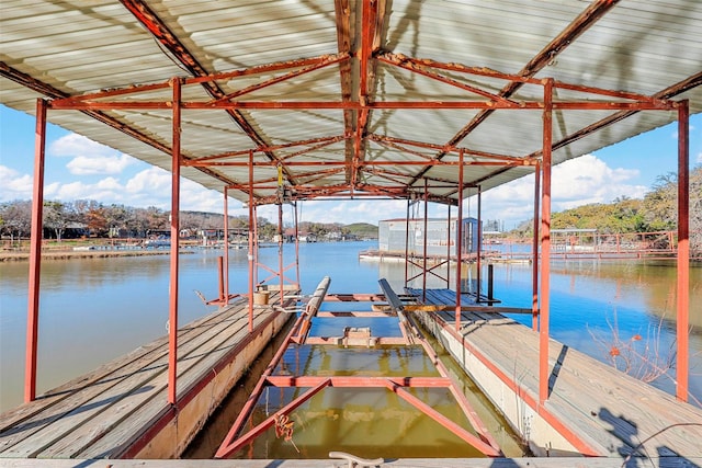 dock area featuring a water view